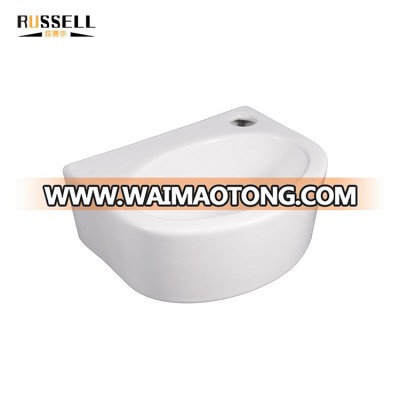 Home use bathroom hand wash ceramic round wall hung sink